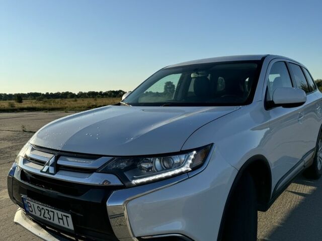 Белый Мицубиси Аутлендер, объемом двигателя 2.4 л и пробегом 91 тыс. км за 15900 $, фото 2 на Automoto.ua