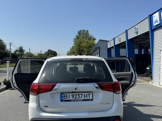Белый Мицубиси Аутлендер, объемом двигателя 2.4 л и пробегом 91 тыс. км за 15900 $, фото 5 на Automoto.ua