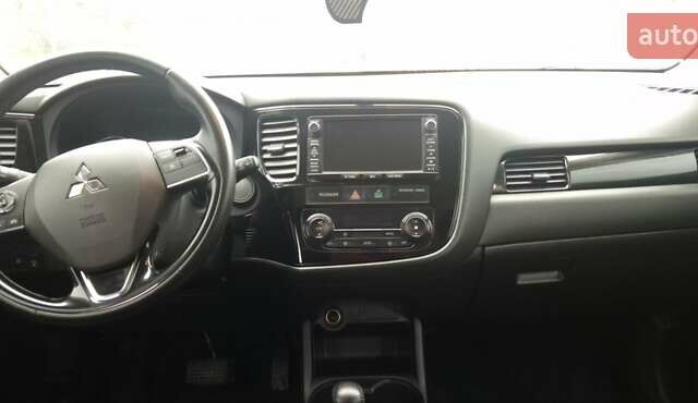 Белый Мицубиси Аутлендер, объемом двигателя 2.4 л и пробегом 240 тыс. км за 14900 $, фото 17 на Automoto.ua