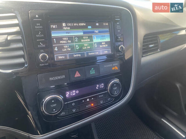 Білий Міцубісі Аутлендер, об'ємом двигуна 2.36 л та пробігом 159 тис. км за 15500 $, фото 14 на Automoto.ua