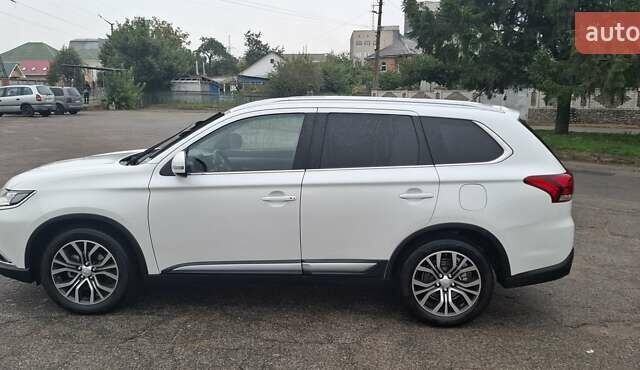 Білий Міцубісі Аутлендер, об'ємом двигуна 2.3 л та пробігом 158 тис. км за 18200 $, фото 6 на Automoto.ua