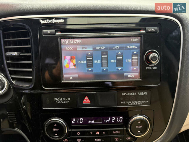 Белый Мицубиси Аутлендер, объемом двигателя 2.4 л и пробегом 160 тыс. км за 16900 $, фото 40 на Automoto.ua