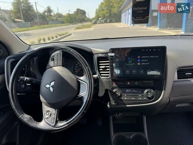 Белый Мицубиси Аутлендер, объемом двигателя 2.4 л и пробегом 91 тыс. км за 14900 $, фото 8 на Automoto.ua