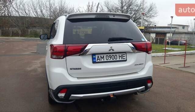 Белый Мицубиси Аутлендер, объемом двигателя 2.4 л и пробегом 240 тыс. км за 14900 $, фото 10 на Automoto.ua