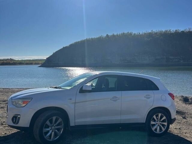 Белый Мицубиси Аутлендер, объемом двигателя 2 л и пробегом 255 тыс. км за 11500 $, фото 5 на Automoto.ua