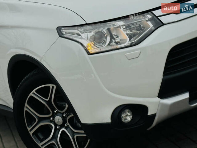 Белый Мицубиси Аутлендер, объемом двигателя 2.2 л и пробегом 140 тыс. км за 16200 $, фото 6 на Automoto.ua