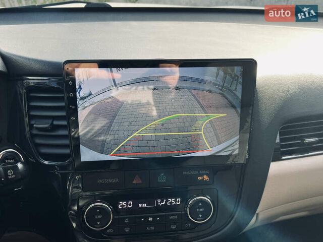 Белый Мицубиси Аутлендер, объемом двигателя 2.4 л и пробегом 147 тыс. км за 12999 $, фото 39 на Automoto.ua