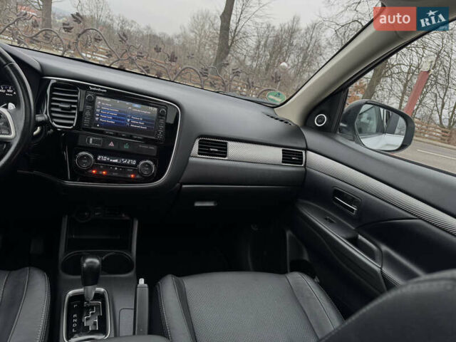 Белый Мицубиси Аутлендер, объемом двигателя 2.2 л и пробегом 140 тыс. км за 16200 $, фото 72 на Automoto.ua