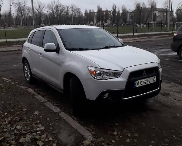 Білий Міцубісі Аутлендер, об'ємом двигуна 2 л та пробігом 89 тис. км за 14000 $, фото 2 на Automoto.ua