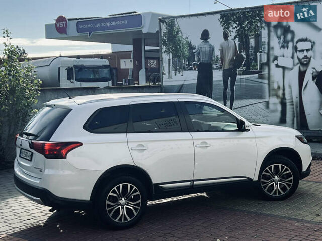 Белый Мицубиси Аутлендер, объемом двигателя 2.4 л и пробегом 147 тыс. км за 12999 $, фото 14 на Automoto.ua