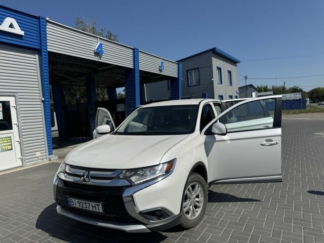 Белый Мицубиси Аутлендер, объемом двигателя 2.4 л и пробегом 91 тыс. км за 15900 $, фото 3 на Automoto.ua