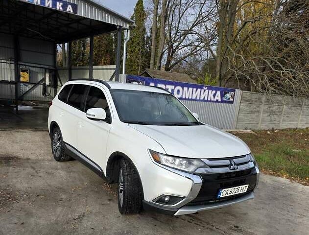 Белый Мицубиси Аутлендер, объемом двигателя 2.36 л и пробегом 169 тыс. км за 13300 $, фото 12 на Automoto.ua