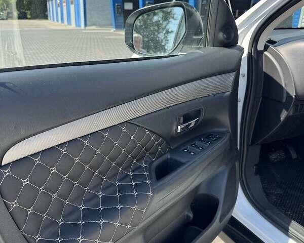 Білий Міцубісі Аутлендер, об'ємом двигуна 2.4 л та пробігом 91 тис. км за 15900 $, фото 11 на Automoto.ua