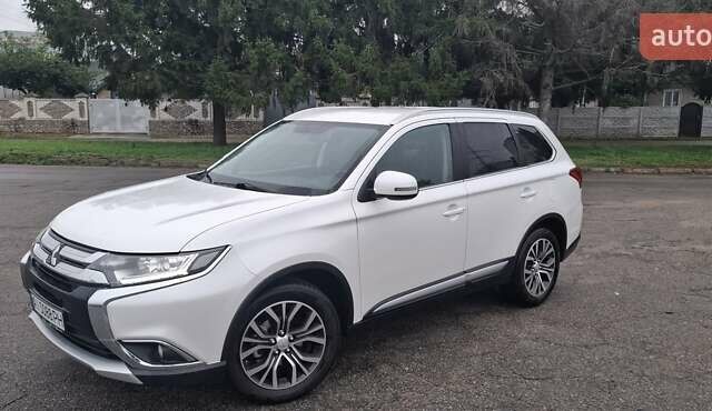 Білий Міцубісі Аутлендер, об'ємом двигуна 2.3 л та пробігом 158 тис. км за 18200 $, фото 2 на Automoto.ua