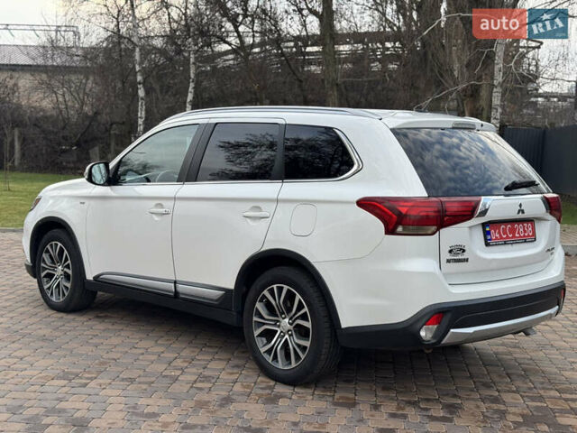 Белый Мицубиси Аутлендер, объемом двигателя 3 л и пробегом 310 тыс. км за 12700 $, фото 20 на Automoto.ua