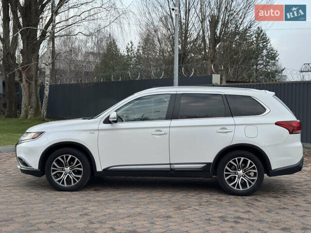 Белый Мицубиси Аутлендер, объемом двигателя 3 л и пробегом 310 тыс. км за 12700 $, фото 25 на Automoto.ua