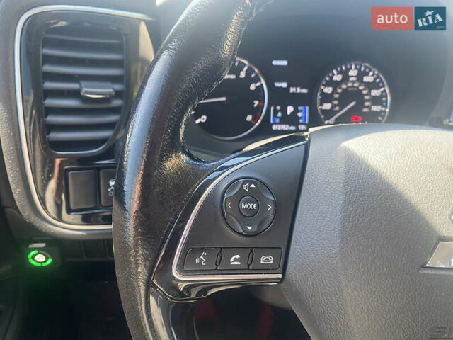 Білий Міцубісі Аутлендер, об'ємом двигуна 2.36 л та пробігом 159 тис. км за 15500 $, фото 16 на Automoto.ua