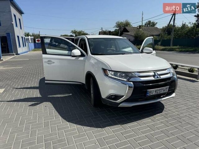 Білий Міцубісі Аутлендер, об'ємом двигуна 2.4 л та пробігом 91 тис. км за 15900 $, фото 3 на Automoto.ua