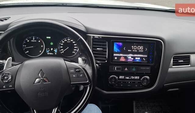 Білий Міцубісі Аутлендер, об'ємом двигуна 2.3 л та пробігом 158 тис. км за 18200 $, фото 8 на Automoto.ua