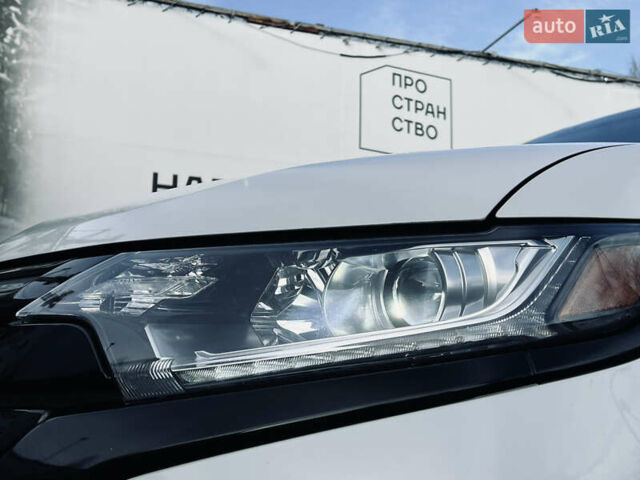 Белый Мицубиси Аутлендер, объемом двигателя 2.4 л и пробегом 147 тыс. км за 12999 $, фото 26 на Automoto.ua