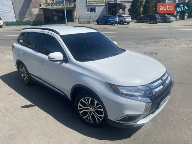 Білий Міцубісі Аутлендер, об'ємом двигуна 2.36 л та пробігом 159 тис. км за 15500 $, фото 1 на Automoto.ua