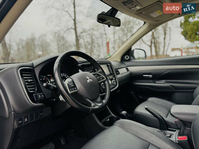 Белый Мицубиси Аутлендер, объемом двигателя 2.2 л и пробегом 140 тыс. км за 16200 $, фото 40 на Automoto.ua