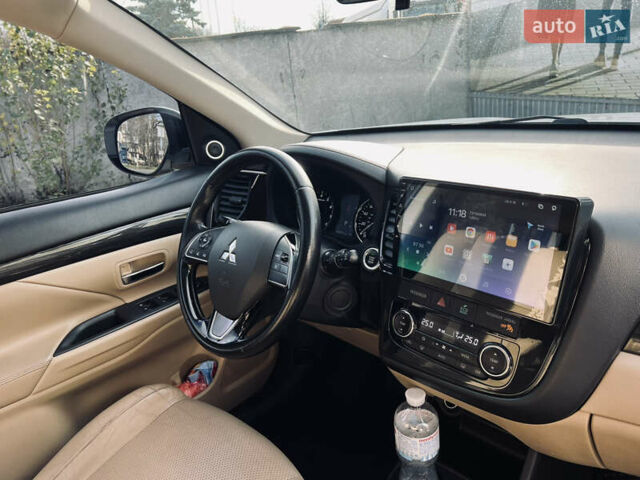 Белый Мицубиси Аутлендер, объемом двигателя 2.4 л и пробегом 147 тыс. км за 12999 $, фото 38 на Automoto.ua