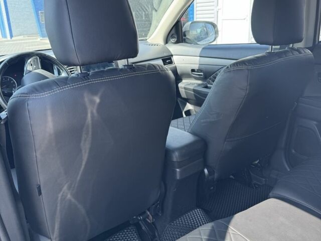 Белый Мицубиси Аутлендер, объемом двигателя 2.4 л и пробегом 91 тыс. км за 15900 $, фото 11 на Automoto.ua