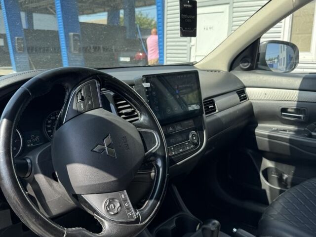 Белый Мицубиси Аутлендер, объемом двигателя 2.4 л и пробегом 91 тыс. км за 15900 $, фото 7 на Automoto.ua