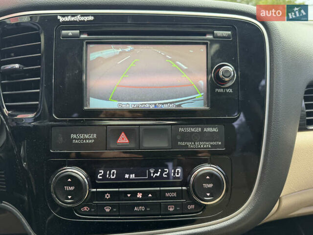 Белый Мицубиси Аутлендер, объемом двигателя 2.4 л и пробегом 159 тыс. км за 16700 $, фото 46 на Automoto.ua