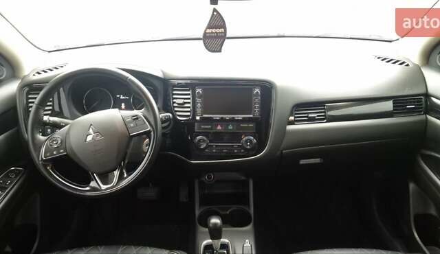 Белый Мицубиси Аутлендер, объемом двигателя 2.4 л и пробегом 240 тыс. км за 14900 $, фото 19 на Automoto.ua