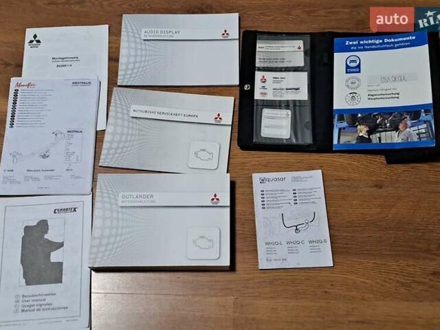 Білий Міцубісі Аутлендер, об'ємом двигуна 2.3 л та пробігом 130 тис. км за 14999 $, фото 25 на Automoto.ua