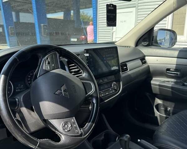 Білий Міцубісі Аутлендер, об'ємом двигуна 2.4 л та пробігом 91 тис. км за 15900 $, фото 6 на Automoto.ua