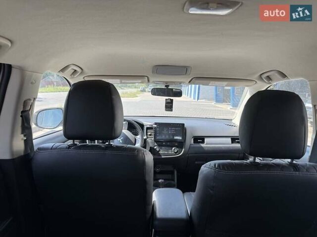 Білий Міцубісі Аутлендер, об'ємом двигуна 2.4 л та пробігом 91 тис. км за 15900 $, фото 12 на Automoto.ua