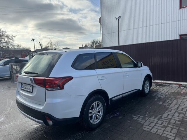 Белый Мицубиси Аутлендер, объемом двигателя 2.4 л и пробегом 91 тыс. км за 15900 $, фото 17 на Automoto.ua