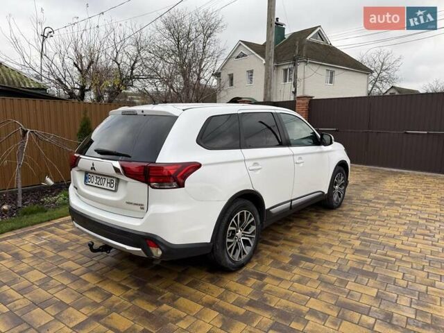 Белый Мицубиси Аутлендер, объемом двигателя 2.36 л и пробегом 191 тыс. км за 13950 $, фото 12 на Automoto.ua