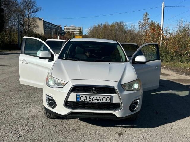 Белый Мицубиси Аутлендер, объемом двигателя 2 л и пробегом 255 тыс. км за 11500 $, фото 14 на Automoto.ua