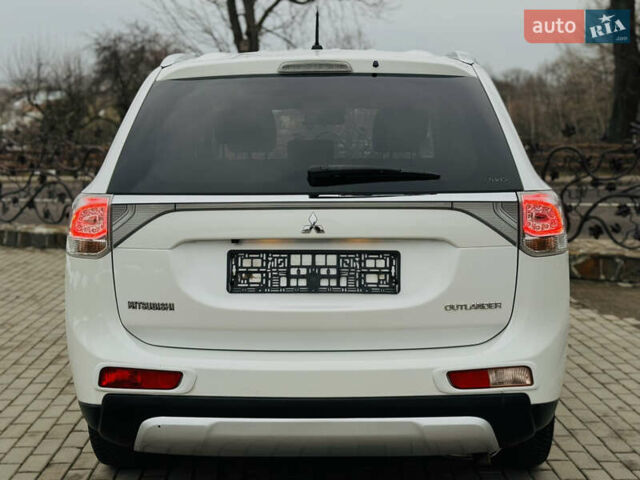 Белый Мицубиси Аутлендер, объемом двигателя 2.2 л и пробегом 140 тыс. км за 16200 $, фото 26 на Automoto.ua