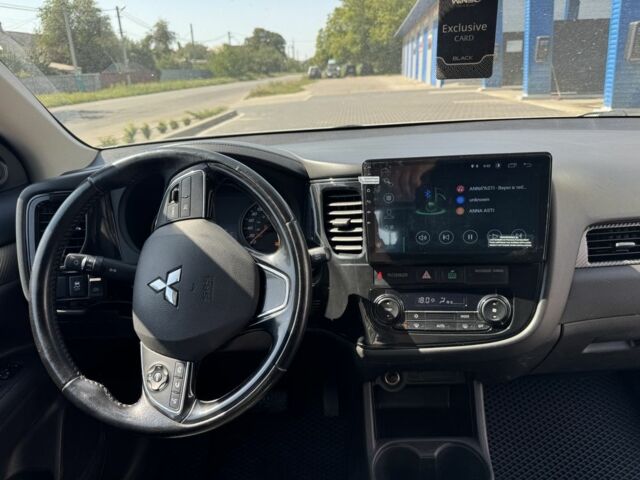 Белый Мицубиси Аутлендер, объемом двигателя 2.4 л и пробегом 91 тыс. км за 15900 $, фото 9 на Automoto.ua