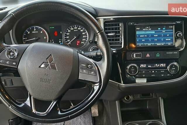 Білий Міцубісі Аутлендер, об'ємом двигуна 2.3 л та пробігом 130 тис. км за 14999 $, фото 17 на Automoto.ua