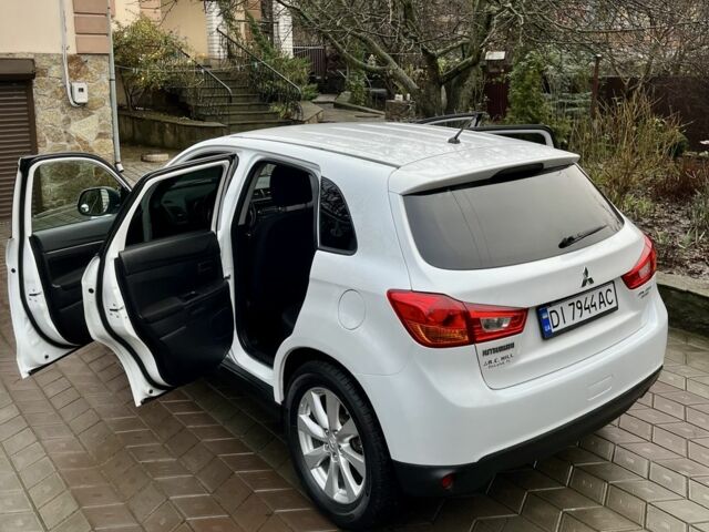 Белый Мицубиси Аутлендер, объемом двигателя 2 л и пробегом 168 тыс. км за 10800 $, фото 7 на Automoto.ua
