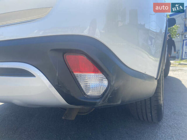 Білий Міцубісі Аутлендер, об'ємом двигуна 2.36 л та пробігом 159 тис. км за 15500 $, фото 7 на Automoto.ua