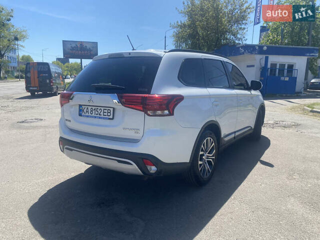 Білий Міцубісі Аутлендер, об'ємом двигуна 2.36 л та пробігом 159 тис. км за 15500 $, фото 6 на Automoto.ua