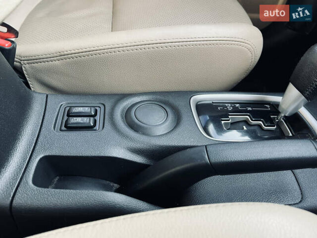 Белый Мицубиси Аутлендер, объемом двигателя 2.4 л и пробегом 147 тыс. км за 12999 $, фото 41 на Automoto.ua