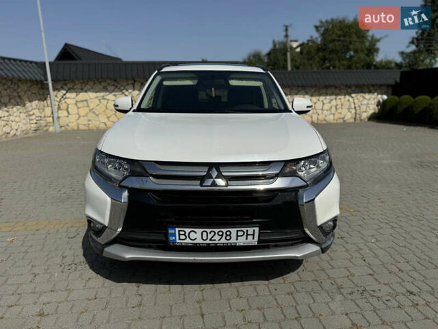 Белый Мицубиси Аутлендер, объемом двигателя 2.4 л и пробегом 149 тыс. км за 15900 $, фото 1 на Automoto.ua