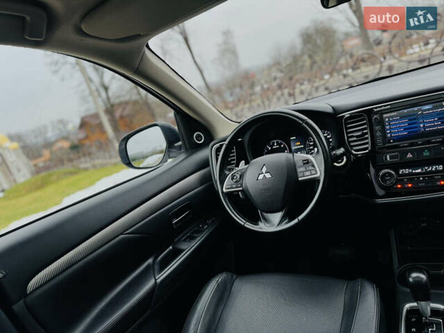 Белый Мицубиси Аутлендер, объемом двигателя 2.2 л и пробегом 140 тыс. км за 16200 $, фото 71 на Automoto.ua