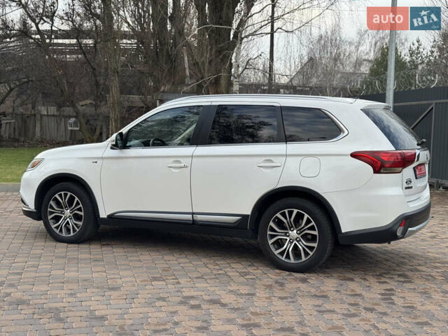 Белый Мицубиси Аутлендер, объемом двигателя 3 л и пробегом 310 тыс. км за 12700 $, фото 37 на Automoto.ua