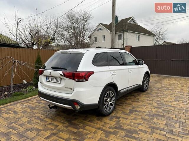 Белый Мицубиси Аутлендер, объемом двигателя 2.36 л и пробегом 191 тыс. км за 13950 $, фото 13 на Automoto.ua