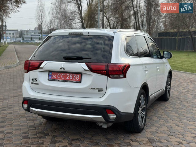 Белый Мицубиси Аутлендер, объемом двигателя 3 л и пробегом 310 тыс. км за 12700 $, фото 31 на Automoto.ua
