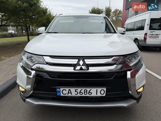 Білий Міцубісі Аутлендер, об'ємом двигуна 2.4 л та пробігом 159 тис. км за 17700 $, фото 12 на Automoto.ua